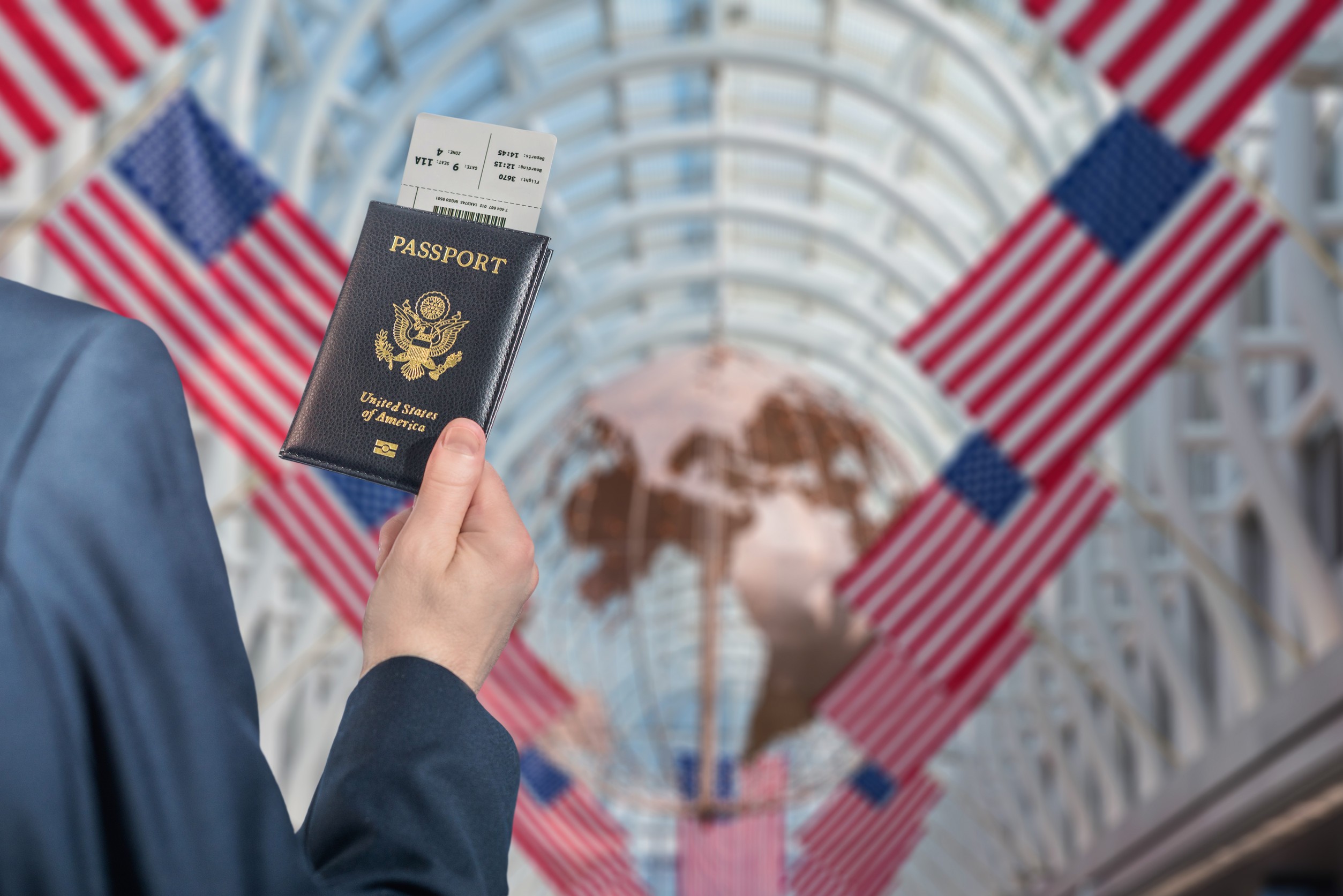 Holding American Passport With Boarding Pass