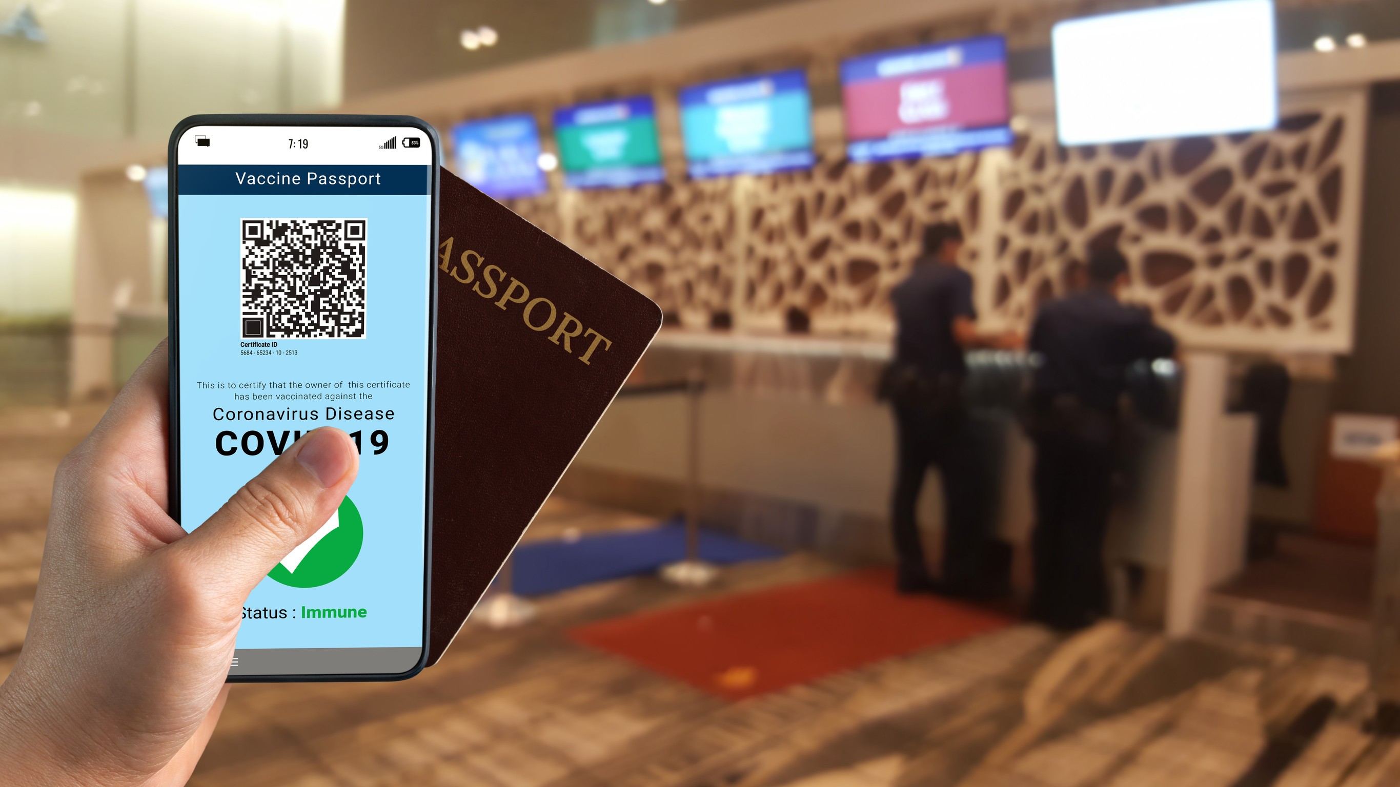 Traveler Holds Vaccine Passport Certificate To Show Covid